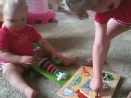 Playing with her new puzzles..